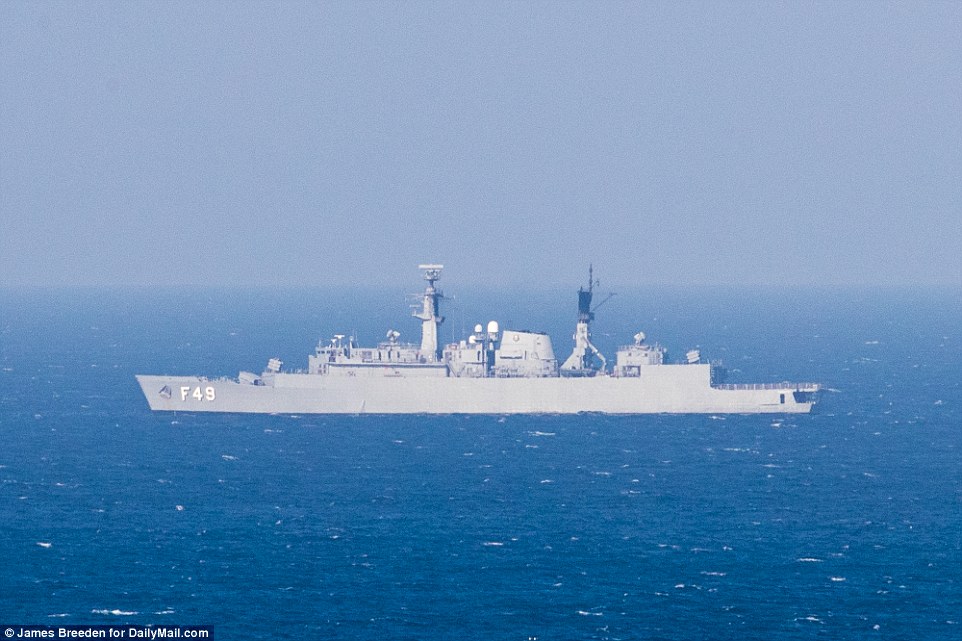 Leading the fleet: Frigate Rademaker is the most powerful of the Brazilian navy ships stationed on patrol off the Copacabana beach 